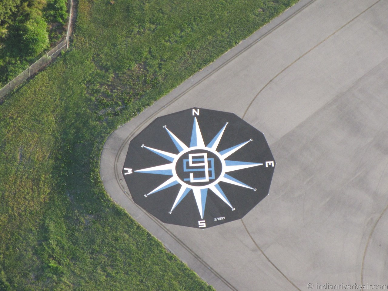 Sebastian, Florida compass rose painted February 9, by members of the Spaceport 99s, the Embry Riddle 99s, and the FIT Flight Team.  Photo taken by Joe Griffin, Airport Manager